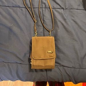 Travelon cross body small purse, brown. Lots of pockets!